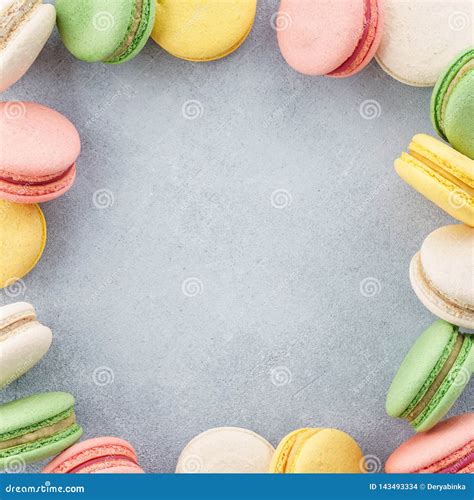 Frame Made Of Colorful French Macarons Creative Background Stock Photo