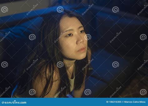 Young Beautiful Sad And Depressed Asian Korean Woman Crying In Tears On