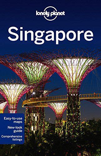 The Cover Of Lonely Planets Guide To Singapore With Colorful Lights