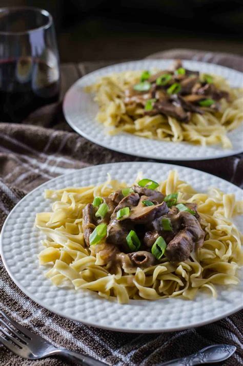 This 30 minute beef stroganoff has juicy beef (no dry chewy beef here!) smothered in a creamy the most amazing beef stroganoff you will ever have! 30-Minute Beef Stroganoff • The Crumby Kitchen