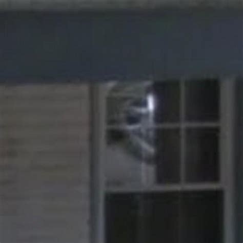 Scary Face In The Window Of The Sallie Ghost House In