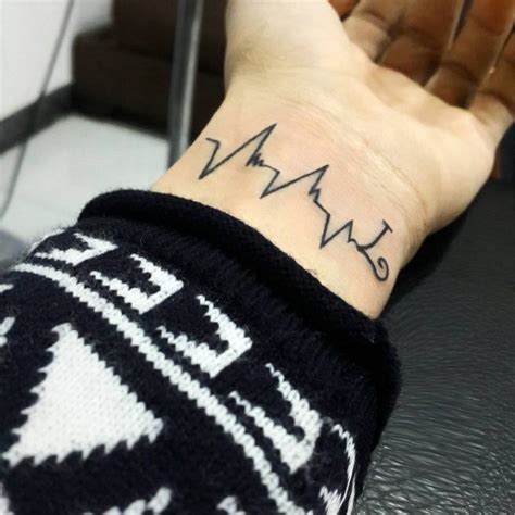 30 Heartbeat Tattoo Designs And Meanings Feel Your Own Rhythm