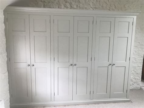 Bespoke Hand Painted Shaker Style Wardrobes All Set Within A Quaint