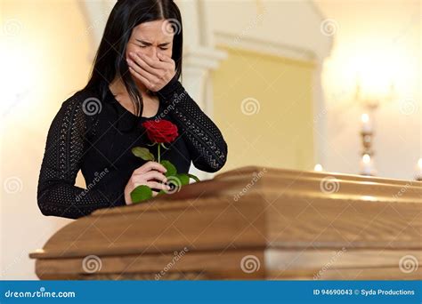 Crying Woman With Red Rose And Coffin At Funeral Stock Image Image Of
