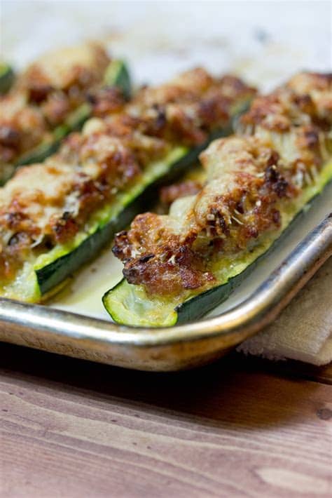 Learn how to make zucchini boats to use up your garden squash with this flavorful stuffed italian zucchini boats recipe! Stuffed Zucchini Boats