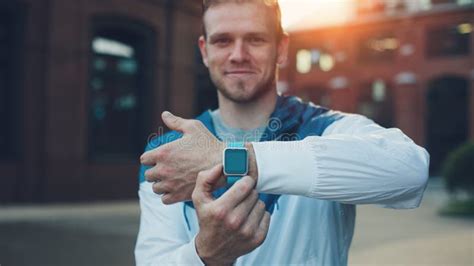 Cheerful Man Showing His Smart Watches On The Wrist Stock Image Image