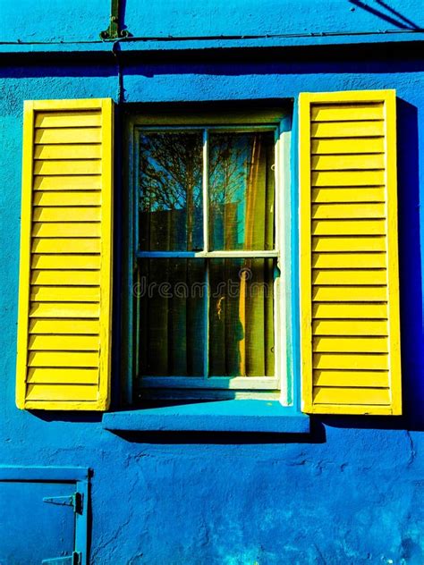 Old Window With Bright Yellow Shutters Stock Photo Image Of Green