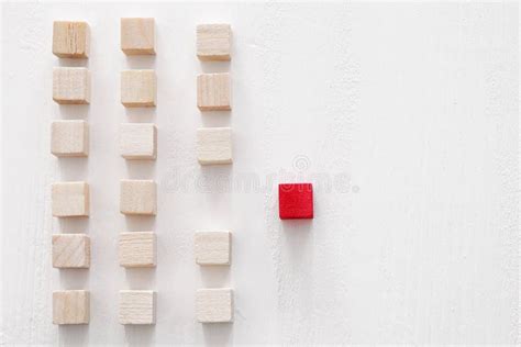 One Different Red Cube Block Among Wooden Blocks Individuality