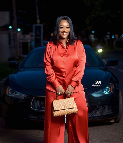 Jackie Appiah Stuns In New Photos As She Poses With Her Maserati