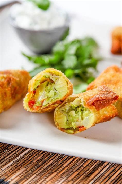 Fold in the two sides, then fold over the bottom. Crispiest Avocado Egg Rolls (Copycat Recipe) - Baking Beauty