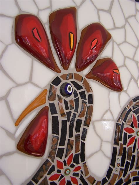 It dries transparent, so it won't alter the color of the tiles. Glittering Shards | Rooster mosaic & grouting top tips