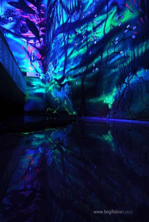 Artist Paints Rooms With Murals That Glow Under Blacklight