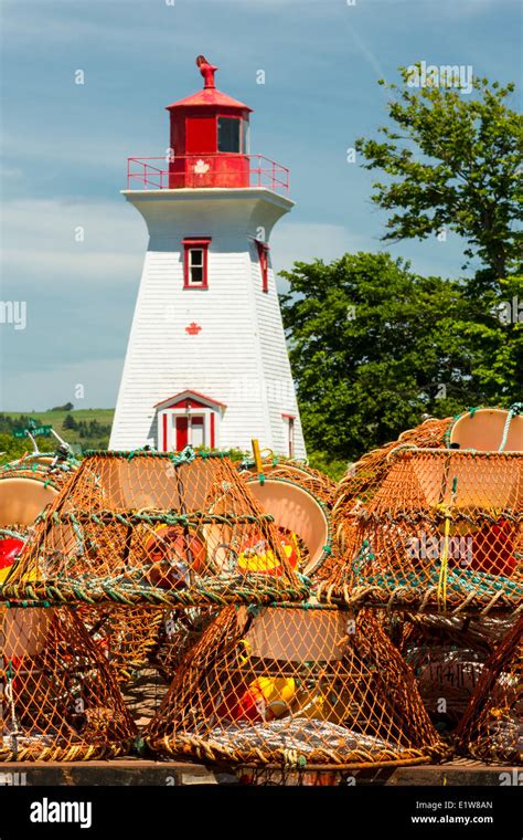 Lighthouse And Crab Traps Victoria Prince Edward Island Canada Stock