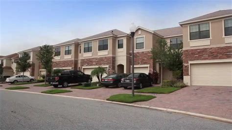 Luxury townhomes and apartments at the bottleworks. New Townhomes for sale Orlando, FL Portofino Meadows - YouTube