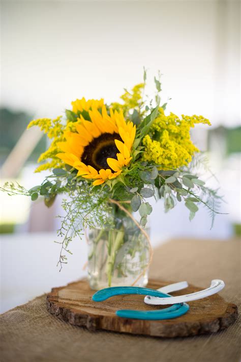 Centerpieces Of Sunflowers In Mason Jars On Wood Slabs Sunflower