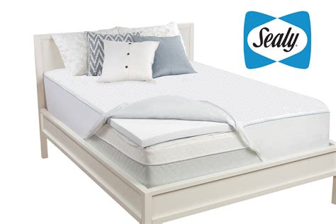 This mattress, priced at $999 for a queen, also has pocketed coils, additional edge support, and posturepedic targeted support in the middle section in the form of gel. Sealy 2" Queen Memory Foam Mattress Topper at Gardner-White