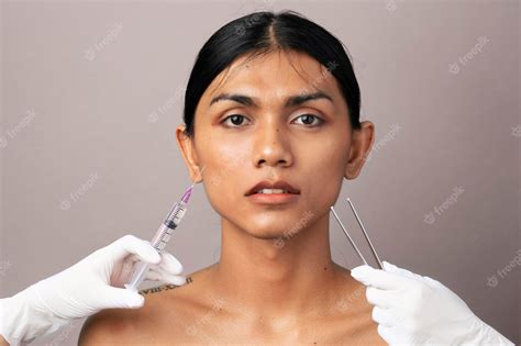 Premium Photo Beautiful Woman Gets A Botox Injection On Her Face