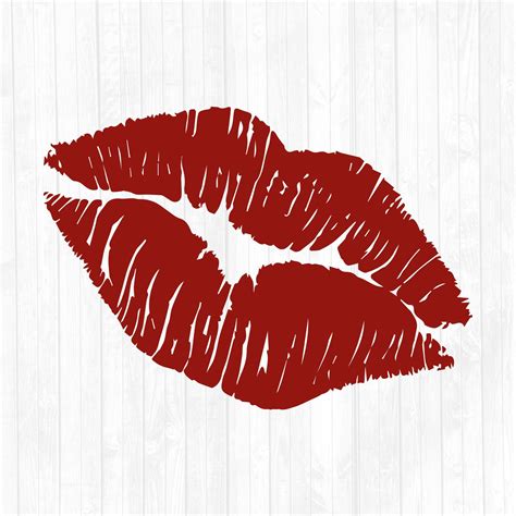 A Red Lipstick Imprint On A White Wooden Background With The Word Love