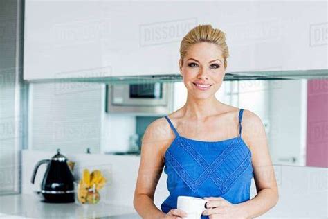 Woman In Kitchen Portrait Stock Photo Dissolve