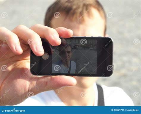 Young Man Taking A Selfie With His Mobile Phone Stock Image Image Of