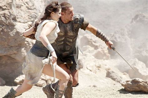 Gemma Arterton Stars As Io And Sam Worthington Stars As Perseus In