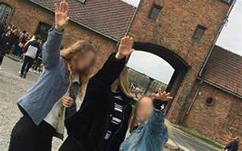 polish teens probed over photo of nazi salute at auschwitz the times of israel