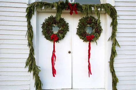How To Hang A Garland Over The Front Door Martha Stewart