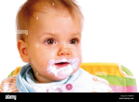 Baby Its Mouth Smeared With Ice Cream Stock Photo Alamy
