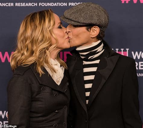 maria bello 52 plants a kiss on the lips of her fiancee daily mail online