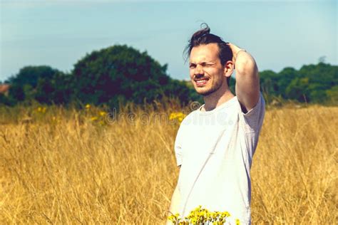 Man Standing In Field Of Dry Grass Stock Photo Image Of Happiness