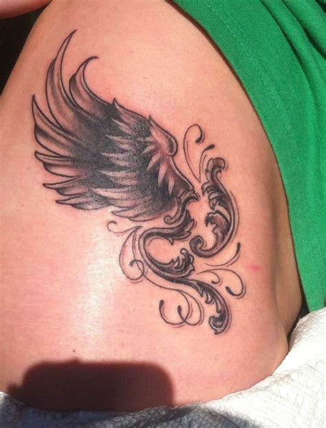 25 Amazing Angel Wings Tattoo With Name In The Middle Ideas In 2021