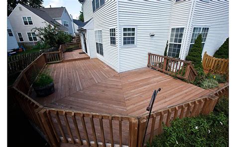 A Wrap Around Deck Makeover Featuring Enhance In Clam Shell And Beach