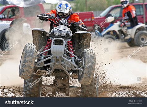 If you have proper safety gear and feel comfortable on your quad, then let's learn how to pop a wheelie the right way. Atv Wheelie Stock Photo 1677891 : Shutterstock