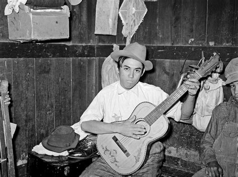 Learn how with this free video guitar lesson. History in Photos: Russell Lee - Musicians