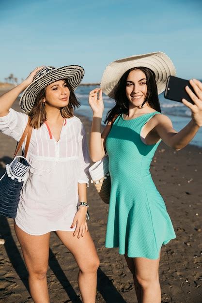 Free Photo Women Posing For Selfie At The Beach