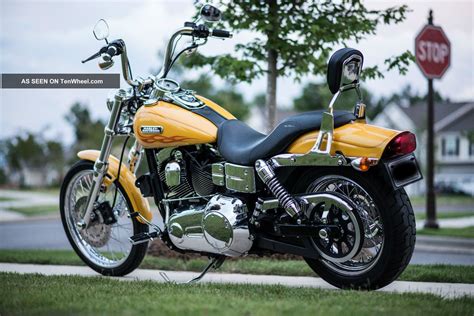 Color black pearl, 2,000 miles, perfect condition, $1,104.30 pig trail dealer added accessories, $2,029.93 hd factory accessories including: 2007 Harley Davidson Dyna Wide Glide Pearl Yellow V&h Pipes