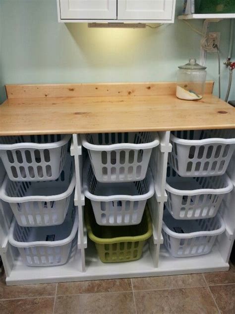 Up first, we needed a shelf. Awesome 9-basket laundry basket "dresser"! | Laundry room ...