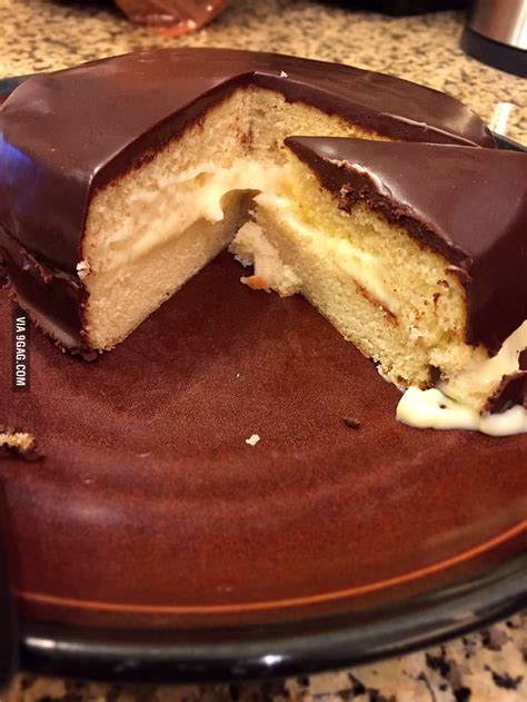 A cake filled with vanilla pastry cream and topped with chocolate. Boston Cream Pie - 9GAG