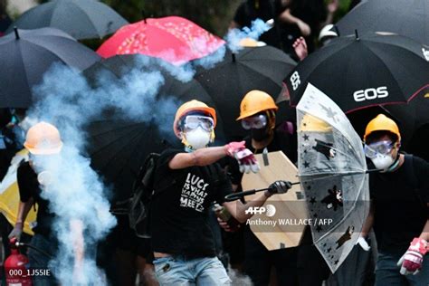 Afp Photo On Twitter Olice Fire Tear Gas Rubber Bullets At Hong