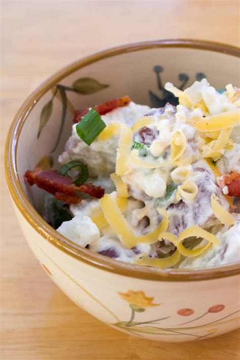 You no longer have to choose between a loaded baked potato and a potato salad, 'cause our loaded baked potato salad offers the best of both worlds! Loaded Baked Potato Salad | Or Whatever You Do