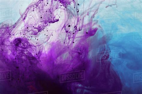 Abstract Background With Purple And Blue Mixing Paint Swirls Stock