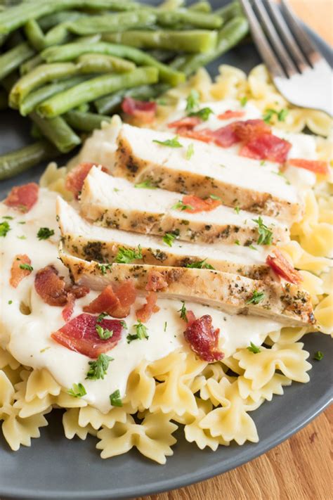 Carbonara is an italian dish of spaghetti with a sauce of cream, eggs, parmesan cheese and bits of bacon. Creamy Chicken Carbonara | The Cook's Treat