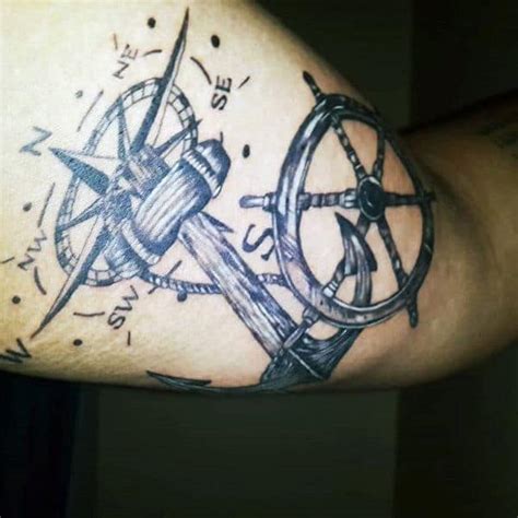 When anchor tattoos are combined with other symbols, it creates new meanings. 70 Ship Wheel Tattoo Designs For Men - A Meaningful Voyage