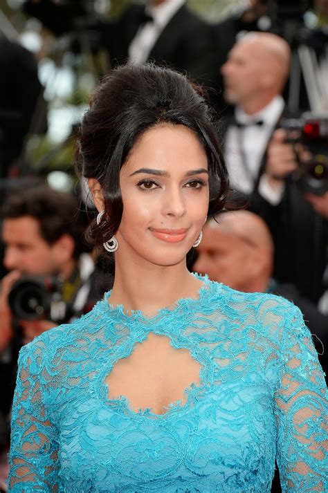 High Quality Bollywood Celebrity Pictures Mallika Sherawat Showcasing Her Sexy Curves In Blue
