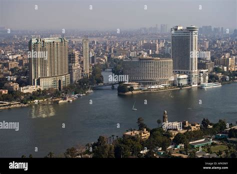 The Four Seasons And Grand Hyatt Hotels Stand On The Banks Of The Nile