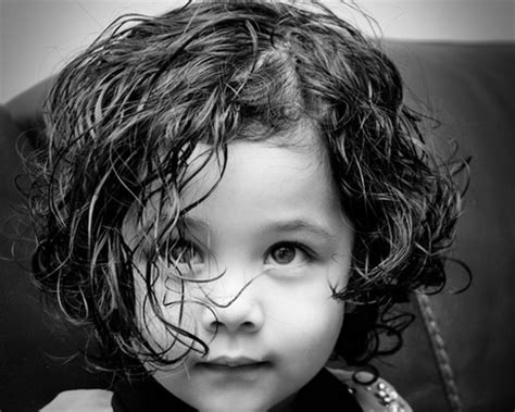 Little girls look so adorable with the layers, and adding thick and shorter bangs can give you a new look. Short curly hairstyles for kids