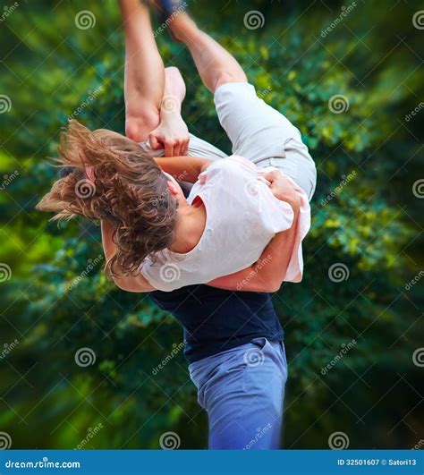 man lifts up girl stock image image of happy male playful 32501607