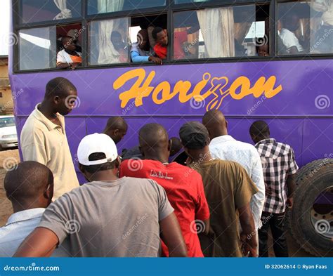 African Bus Passengers Watching The Tire Get Fixed Editorial Stock
