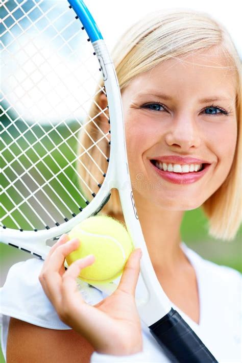 Bringing Beauty To The Game Portrait Of A Young Female Tennis Player