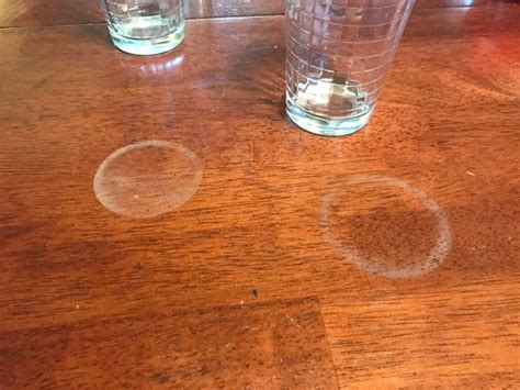 Rub the cloth over the stain until the stain is removed. Removing Water Marks from Wood Furniture | ThriftyFun